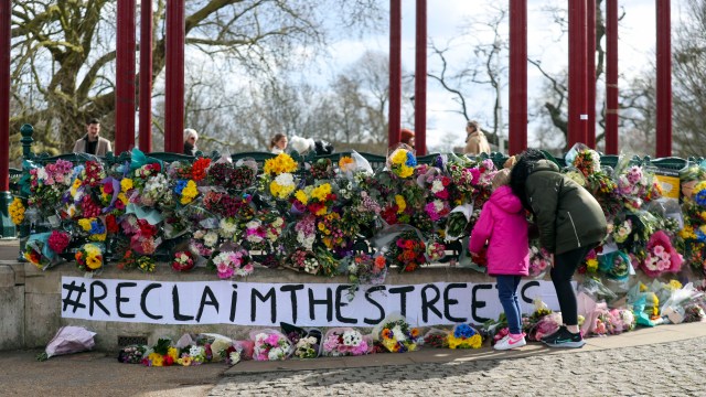 Article thumbnail: People leave floral tributes at the band stand in Clapham Common, London, after the Reclaim These Streets vigil for Sarah Everard was officially cancelled. Serving police constable Wayne Couzens, 48, was charged on Friday evening with kidnapping and killing the marketing executive, who went missing while walking home from a friend's flat in south London on March 3. Picture date: Saturday March 13, 2021. PA Photo. See PA story POLICE Reclaim. Photo credit should read: Steve Parsons/PA Wire