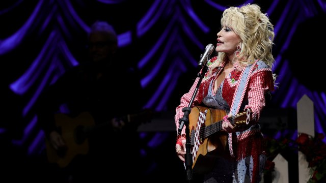 Article thumbnail: AUSTIN, TEXAS - MARCH 18: Dolly Parton performs on stage at ACL Live during Blockchain Creative Labs??? Dollyverse event at SXSW during the 2022 SXSW Conference and Festivals on March 18, 2022 in Austin, Texas. (Photo by Michael Loccisano/Getty Images for SXSW)