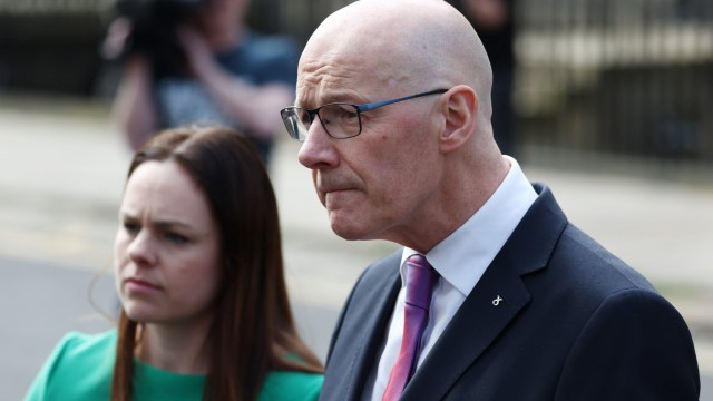 Article thumbnail: EDINBURGH, SCOTLAND - MAY 8: Newly appointed First Minister of Scotland John Swinney and deputy First Minister Kate Forbes speak to the media outside Bute House on May 8, 2024 in Edinburgh, Scotland. John Swinney forms his government, with cabinet posts to be confirmed in parliament on Thursday. (Photo by Jeff J Mitchell/Getty Images)