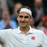 Article thumbnail: Switzerland's Roger Federer celebrates winning against Italy's Lorenzo Sonego during their men's singles fourth round match on the seventh day of the 2021 Wimbledon Championships at The All England Tennis Club in Wimbledon, southwest London, on July 5, 2021. - RESTRICTED TO EDITORIAL USE (Photo by Glyn KIRK / AFP) / RESTRICTED TO EDITORIAL USE (Photo by GLYN KIRK/AFP via Getty Images)