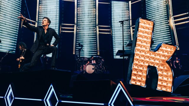 Article thumbnail: Frontman Brandon Flowers on stage at The Killers' gig at Co-op Live Arena Manchester (Photo: Chris Phelps)