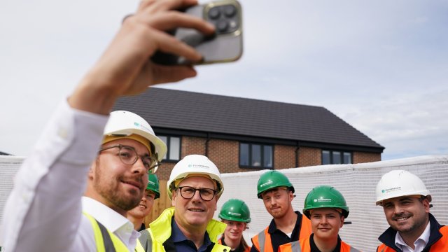 Article thumbnail: YORK, ENGLAND - JUNE 20: Labour leader Sir Keir Starmer poses for a 'selfie' as he visits the Persimmon Homes Germany Beck housing development on June 20, 2024 in York, United Kingdom. Labour pledges to build 1.5 million new homes over the next parliament by supporting housing associations to enhance their capacity for affordable housing, setting mandatory housing targets for councils, and recruiting hundreds of new planners to address planning backlogs. (Photo by Ian Forsyth/Getty Images)