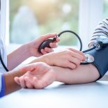 Article thumbnail: Doctor measures the pressure of the patient during a medical examination and consultation in the hospital