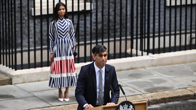 Article thumbnail: Britain's outgoing Prime Minister and leader of the Conservative party, Risihi Sunak, watched by his wife Akshata Murty, delivers a statement after losing the general election, outside 10 Downing Street in London on July 5, 2024, a day after Britain held a general election. British leader Rishi Sunak conceded defeat Friday to Keir Starmer's main opposition Labour party in the UK general election, saying, "I take responsibility for the loss". (Photo by JUSTIN TALLIS / AFP) (Photo by JUSTIN TALLIS/AFP via Getty Images)