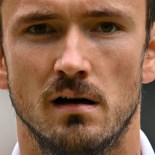 Article thumbnail: Russia's Daniil Medvedev reacts as he plays against Spain's Carlos Alcaraz during their men's singles semi-final tennis match on the twelfth day of the 2024 Wimbledon Championships at The All England Lawn Tennis and Croquet Club in Wimbledon, southwest London, on July 12, 2024. (Photo by ANDREJ ISAKOVIC / AFP) / RESTRICTED TO EDITORIAL USE (Photo by ANDREJ ISAKOVIC/AFP via Getty Images)