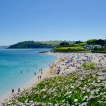 Article thumbnail: Gyllyngvase beach is on the outskirts of Falmouth (Photo: Ewen MacDonald/Getty Images)