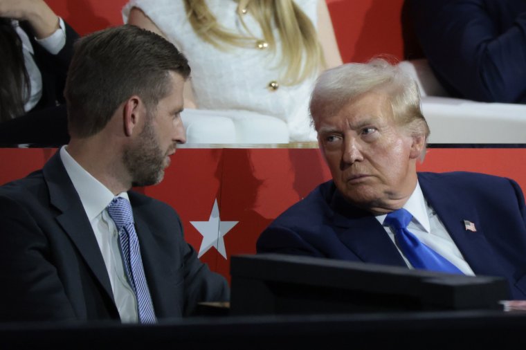 MILWAUKEE, WISCONSIN - JULY 16: Republican presidential candidate, former U.S. President Donald Trump speaks with Eric Trump on the second day of the Republican National Convention at the Fiserv Forum on July 16, 2024 in Milwaukee, Wisconsin. Delegates, politicians, and the Republican faithful are in Milwaukee for the annual convention, concluding with former President Donald Trump accepting his party's presidential nomination. The RNC takes place from July 15-18. (Photo by Scott Olson/Getty Images)