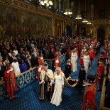 Article thumbnail: Britain's King Charles and Queen Camilla walk through the Royal Gallery on the day of the State Opening of Parliament at the Palace of Westminster in London, Britain, July 17, 2024. REUTERS/Hannah McKay/Pool