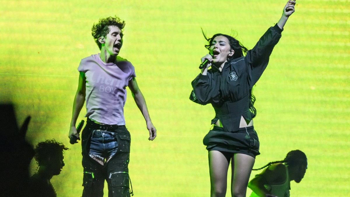 LONDON, ENGLAND - JUNE 27: Charli XCX joins Troye Sivan on stage during the Something to Give Each Other Tour at OVO Arena Wembley on June 27, 2024 in London, England. (Photo by Katja Ogrin/Redferns)