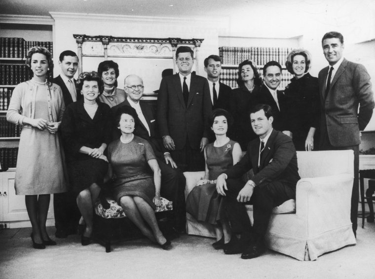 9th November 1960: A group portrait of John F. Kennedy (center) surrounded by his family after the news that he won the U.S. presidential election, Hyannis Port, Massachusetts. (Photo by Hulton Archive/Getty Images)