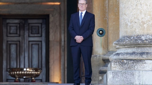 WOODSTOCK, ENGLAND - JULY 18: Britain's Prime Minister Keir Starmer waits to greet guests ahead of the European Political Community summit at Blenheim Palace on July 18, 2024 in Woodstock, England. At the 4th European Political Community Summit, Europe's leaders will focus on energy, infrastructures, connectivity, cybersecurity, countering disinformation and migration. (Photo by Stefan Rousseau - WPA Pool/Getty Images)