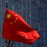 Article thumbnail: FILE PHOTO: The Chinese national flag is seen in Beijing, China April 29, 2020. REUTERS/Thomas Peter/File Photo